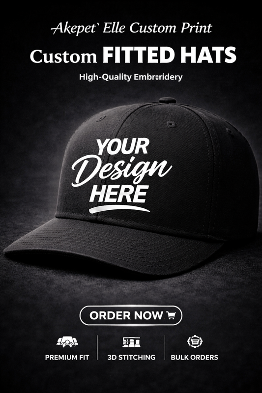 Customizable black fitted baseball cap with white 'Your Design Here' text, showcasing premium embroidery and 3D stitching options.