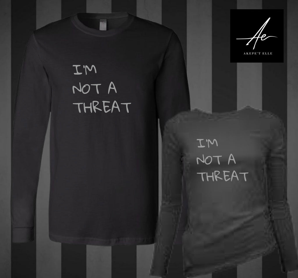 Akepe’t Elle all-black long sleeve shirt with I'm Not A Threat text in minimalist white font