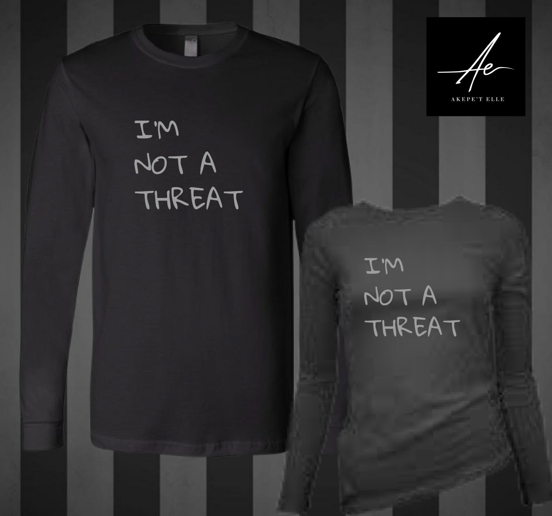 Akepe’t Elle all-black long sleeve shirt with I'm Not A Threat text in minimalist white font